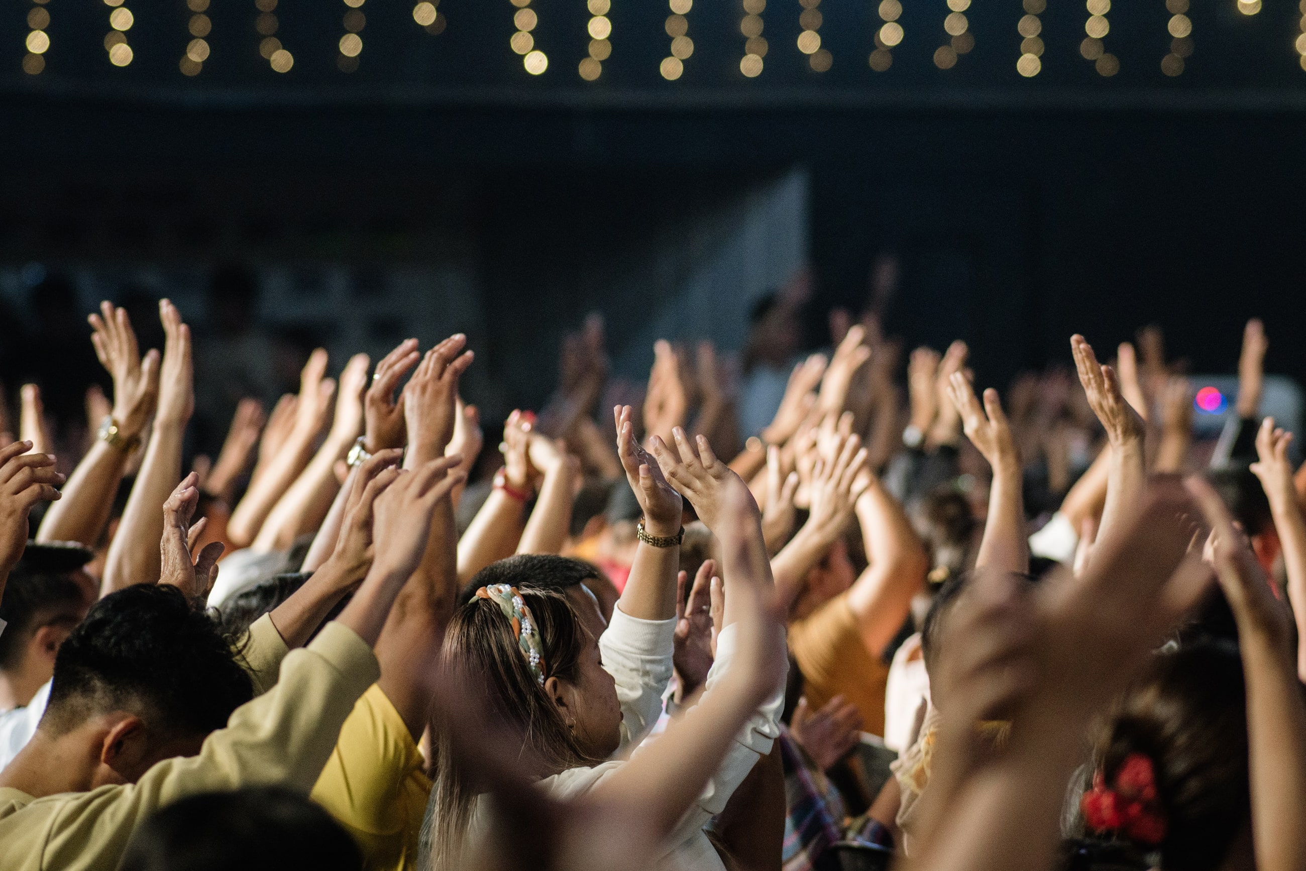 Raised hands praising