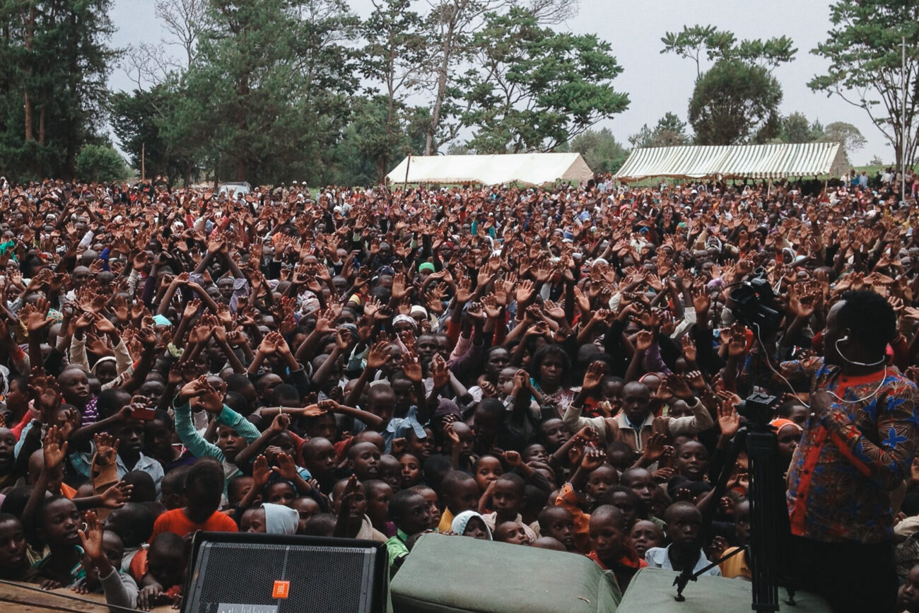 Crowd with hands raised
