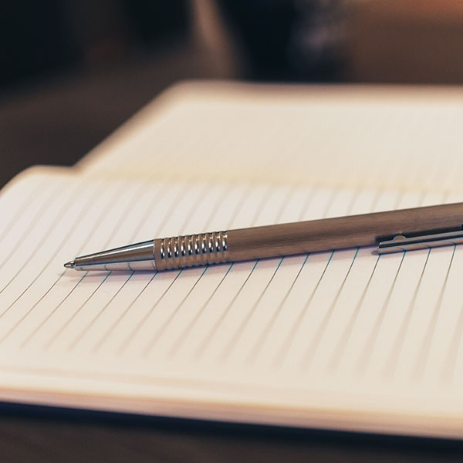 Pen laying on notepad